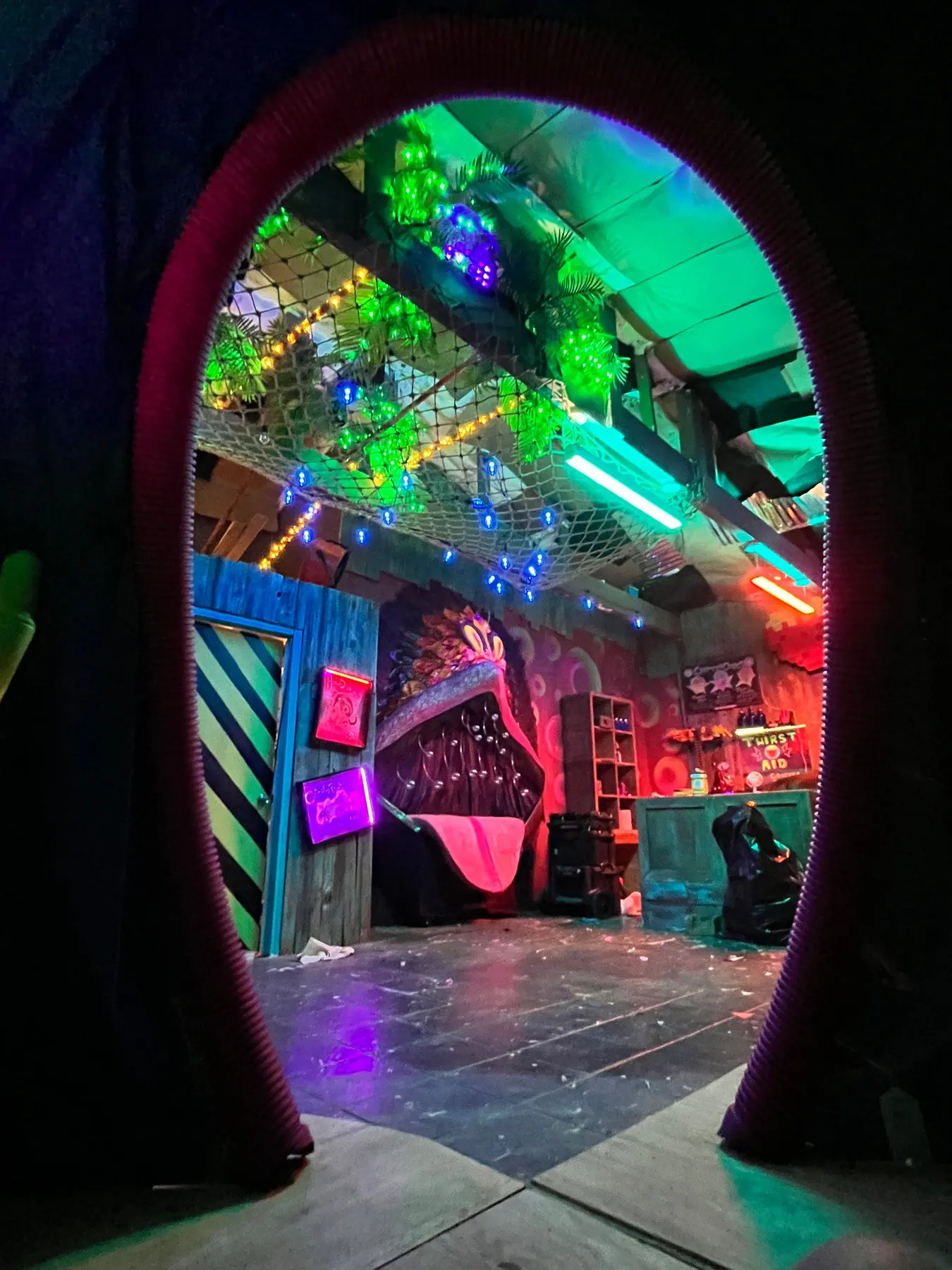 Sculptural ultraviolet threshold opening into the Critter Corral field station