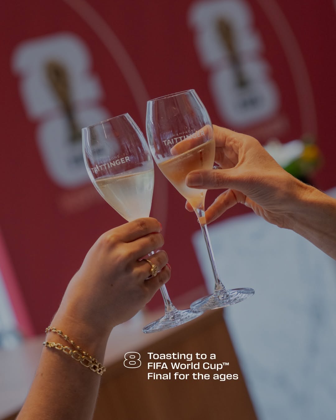 Guests toasting with champagne in a FIFA hospitality environment